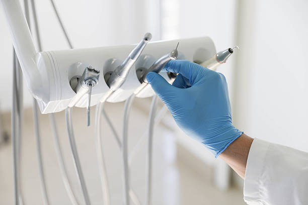 Professional Tooth Extraction technician working in Lancaster, TX